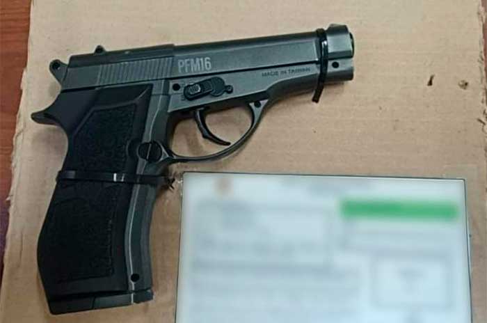 arma detenido