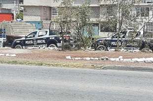 Aparentemente dichos vehículos estaban custodiados por unidades y elementos de la policía municipal