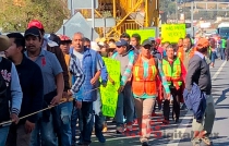 Ejidatarios de Acazulco, inician marcha en protesta por obras del tren interurbano