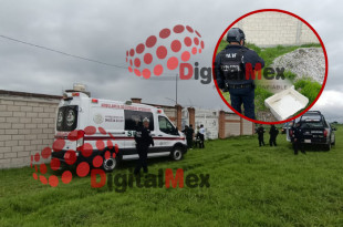 Policías resguardan el lugar donde fue hallado el cuerpo sin vida
