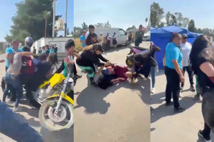 Comerciantes y madre de familia protagonizan violento altercado afuera del CECYTEM en Chicoloapan.